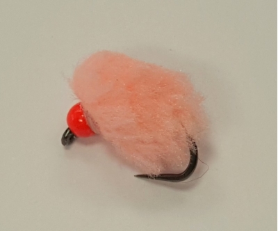 barbless salmon pink eggstacy fly (red bead)